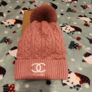 CHANEL Blush Pink Cable Knit Beanie with Pom Pom
